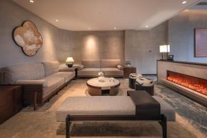 Posezení v ubytování Qing XIA Shan Ju Resort Hotel