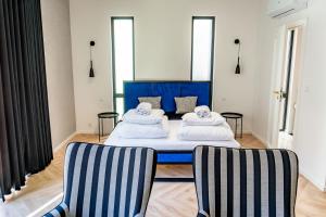 Ένα ή περισσότερα κρεβάτια σε δωμάτιο στο Apartamenty Toruńskie Piekary 12