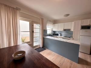 Kuchyň nebo kuchyňský kout v ubytování North Facing Seaside Apartment + 5 fotografií