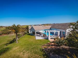 an aerial view of a house with a yard at Fifty1 on Long on Kingswood Golf Estate in George