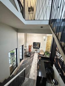 an overhead view of a staircase in a house at Java Hostel 2 in Lumajang