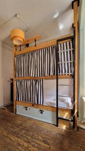 a bunk bed in a room with at Rossio Hostel in Lisbon