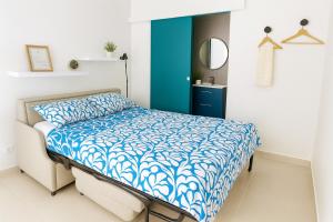 Postel nebo postele na pokoji v ubytování La Dolce Vita Trans-en-Provence Studios & Terrasses