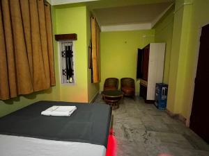 Postel nebo postele na pokoji v ubytování JG Homestay