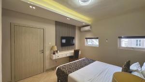 Ένα ή περισσότερα κρεβάτια σε δωμάτιο στο DOMO By Design Union