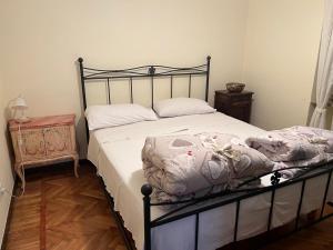 Ένα ή περισσότερα κρεβάτια σε δωμάτιο στο appartamentoviaguedoz