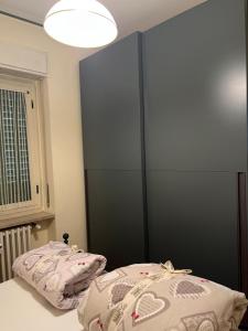 Ένα ή περισσότερα κρεβάτια σε δωμάτιο στο appartamentoviaguedoz