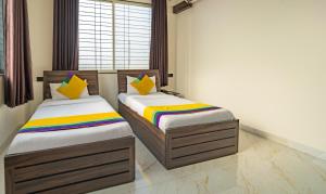 Ένα ή περισσότερα κρεβάτια σε δωμάτιο στο Itsy Hotels Revmantra