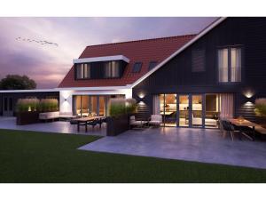 a rendering of a house with a patio at Modern villa in De Cocksdorp near the beach in De Cocksdorp