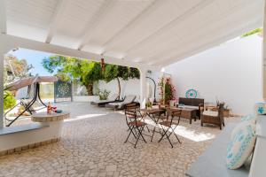 Et opholdsområde på Villetta Nathalie by BarbarHouse