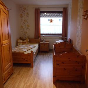 Postel nebo postele na pokoji v ubytování Ferienwohnung Göpfert