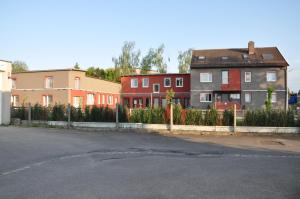 a row of houses on a street at Pension Alis Augsburg in Augsburg