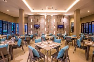 Restaurant o un lloc per menjar a The Crystal Hotel Buriram - formerly X2 Vibe Buriram