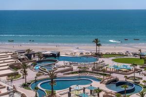 a view of a resort with two pools and a beach at Rubi 805 1 BR 1BA Condo Phase 1 @ Las Palomas in Puerto Peñasco
