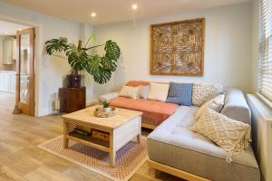 a living room with a couch and a table at Host & Stay - Aurora in Deal