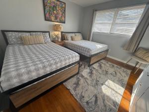 Ένα ή περισσότερα κρεβάτια σε δωμάτιο στο Cozy Valdosta Home Perfect for short Term Rentals