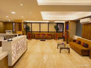 Χώρος καθιστικού στο Hotel Abhinandan