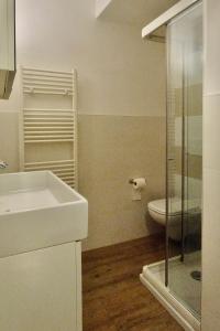 a bathroom with a sink and a toilet and a shower at Ca' Marì Torricelle Bed&Breakfast in Verona +38 photos