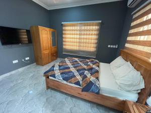 Ένα ή περισσότερα κρεβάτια σε δωμάτιο στο Opan Court