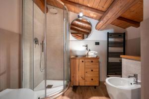 a bathroom with a shower and a sink at Villa With Pool And Vineyards Among Etna Vineyards in Santa Maria di Licodia +21 photos