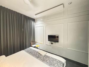 Postel nebo postele na pokoji v ubytování Hotel the lowell