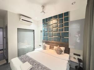 Postel nebo postele na pokoji v ubytování Hotel the lowell