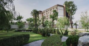 a rendering of a building with a garden at The one ratchaphruek in Ban Nong Bua