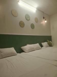 Postel nebo postele na pokoji v ubytování Cute Home