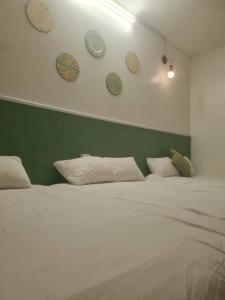 Postel nebo postele na pokoji v ubytování Cute Home