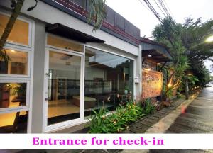 an entrance for check in at a house at Cafe'@luv22 in Phuket Town