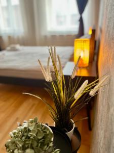 Postel nebo postele na pokoji v ubytování Avotu ApartHotel `self check-in`