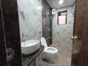 Koupelna v ubytování Vrindavan beach resort