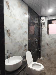 Koupelna v ubytování Vrindavan beach resort