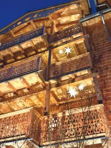 a building with lights on the side of it at SEIN Boutique Suites - ADULTS ONLY in Gosau