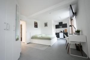 Ένα ή περισσότερα κρεβάτια σε δωμάτιο στο Durdi Hotels Groß-Zimmern 24h Self-CheckIn