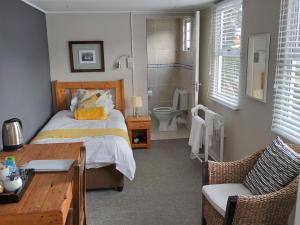 Katil atau katil-katil dalam bilik di Hermanus 13 on 2nd Guest Rooms