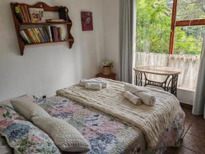 Postel nebo postele na pokoji v ubytování A Jungle House