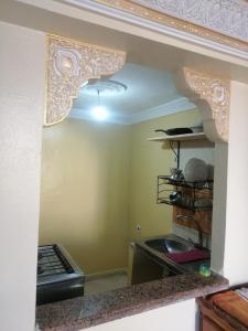 a view of a kitchen with a counter top at Dar Sofiane in Sidi Bouzid