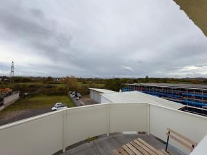 a view from the balcony of a building at Modernes Serviced Apartment Groß-Zimmern - Parkplatz in Groß-Zimmern