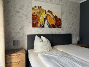 Ένα ή περισσότερα κρεβάτια σε δωμάτιο στο Pension Casa Ambiente