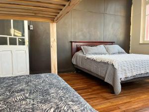 Ένα ή περισσότερα κρεβάτια σε δωμάτιο στο Casa Martin Pesaador +24 φωτογραφίες