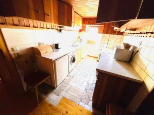 an overhead view of a kitchen with a dishwasher at Ferienwohnung Marie in Kurort Steinbach-Hallenberg