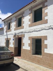 a building with a geometric design on the side of it at El Rincon del Rey in Torrejón del Rey