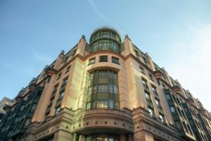 a tall building with a kite in front of it at Radisson Collection Grand Place Brussels in Brussels