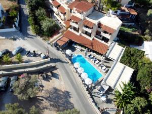 an aerial view of a house with a swimming pool at Vasilaras Hotel in Skala