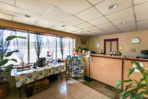a waiting room with a counter and a counter sidx sidx sidx at Edyn Hotel By Townhouse Wytheville US 52 in Wytheville