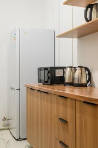 Kuchyň nebo kuchyňský kout v ubytování Uide hotel + 19 fotografií