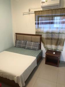 Una cama o camas en una habitación de Monsoleil Hospedaria