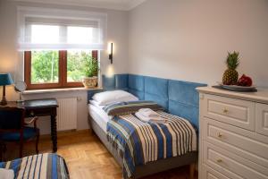 Postel nebo postele na pokoji v ubytování Maya's Flats & Resorts 102 - Premium Apartment Prz