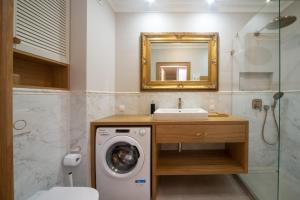 Koupelna v ubytování Maya's Flats & Resorts 102 - Premium Apartment Prz + 48 fotografií